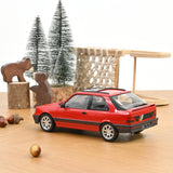 Peugeot 309 GTI 1990 Rouge Vallelunga + déco PTS 1/18 NOREV 184889